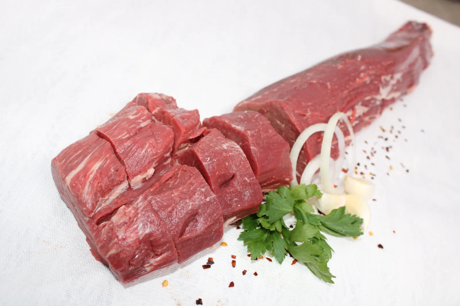 Beef tenderloin cut into medallions